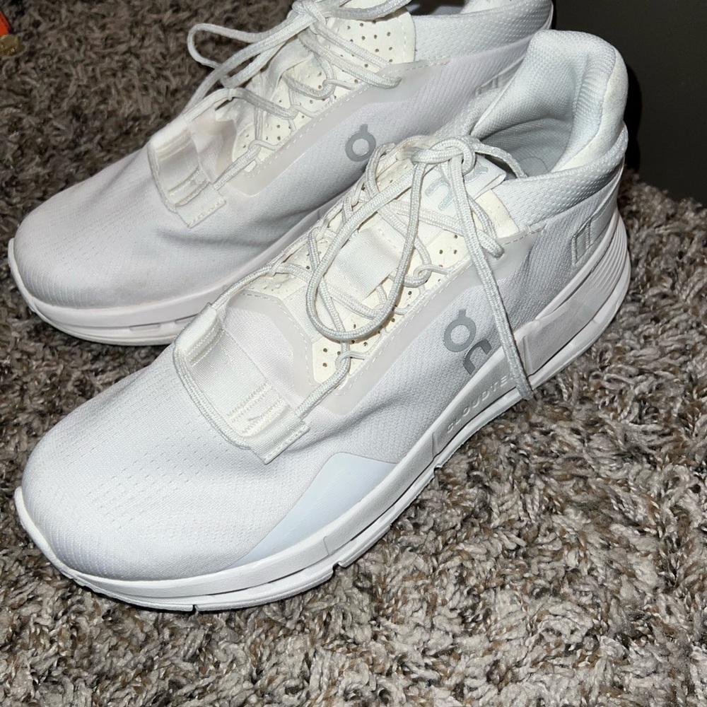 On Running All-White Athletic Shoes